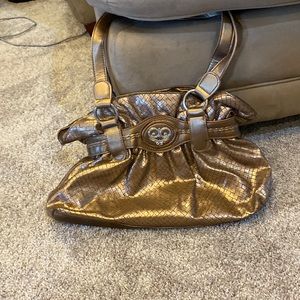 Cute Cato gold- colored purse.  14”x 10”